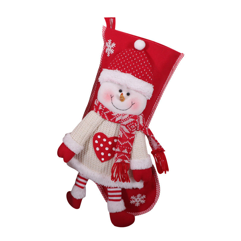 Cloth Christmas stocking offered in four Santa and snowman designs