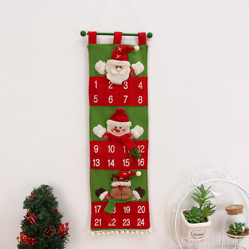 Hanging Christmas countdown calendar with numbered pockets across the panel