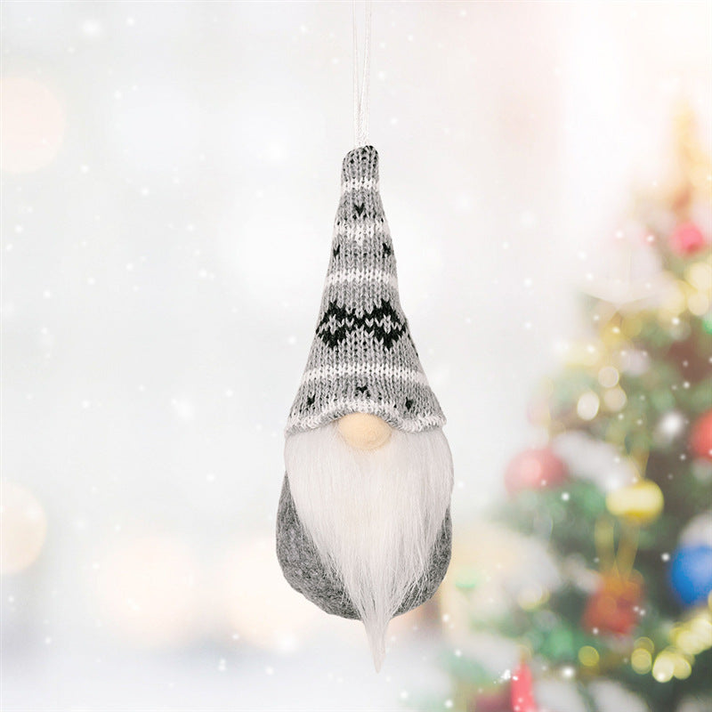 Non woven texture worked across the face of one Christmas pendant