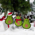 Three felt avocado Christmas tree ornaments from the same set