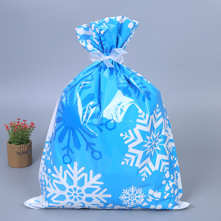 Set of thirty foil Christmas gift bags in blue, gold and green