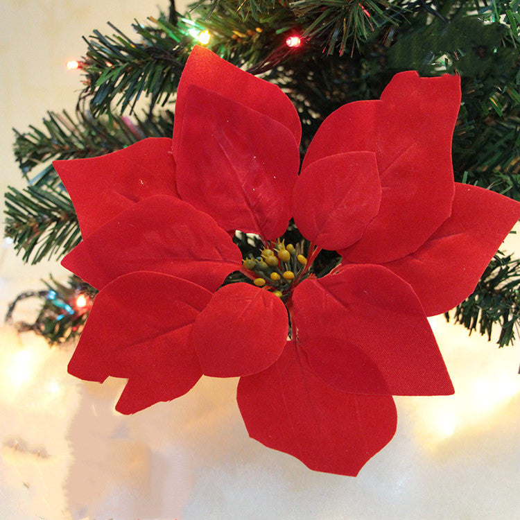 Christmas flower ornament measuring about 8.7 inches across