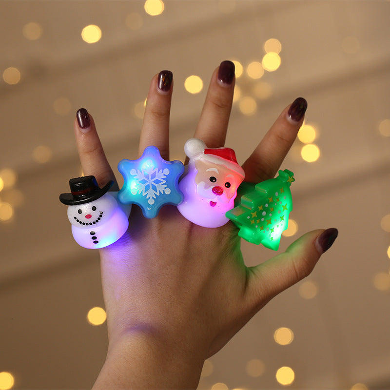 Christmas finger light ring with an LED inside a soft TPR figure