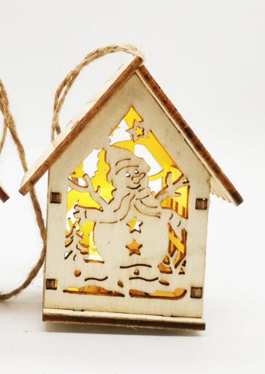 Close grain and cut edges on the boxwood house pendant