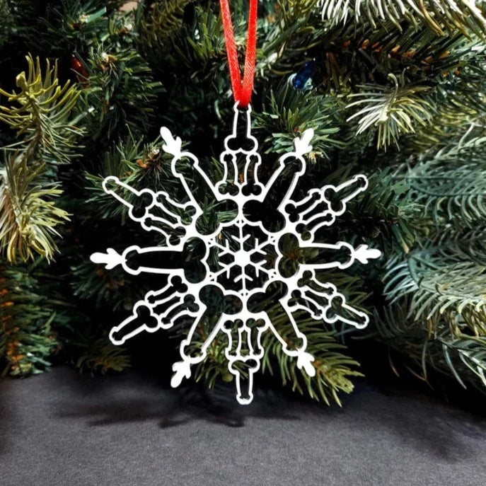 Alloy snowflake Christmas ornament measuring 3.9 by 3.9 inches