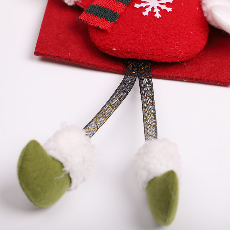 Snowman and reindeer felt door hangers offered in this range