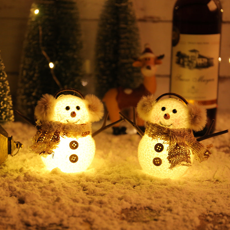 Snowman Christmas figure with a luminous finish that glows in low light