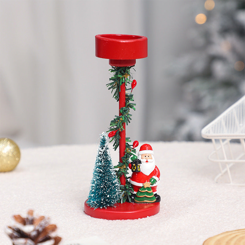 Resin snowman Christmas candlestick, one of three cast figures