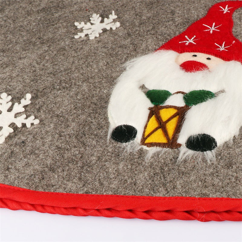 Nordic Santa figure worked around the outside of the tree collar