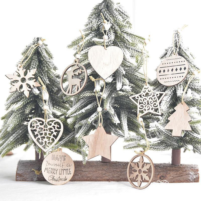 Hollow carved wood snowflake Christmas pendant, twelve to a box