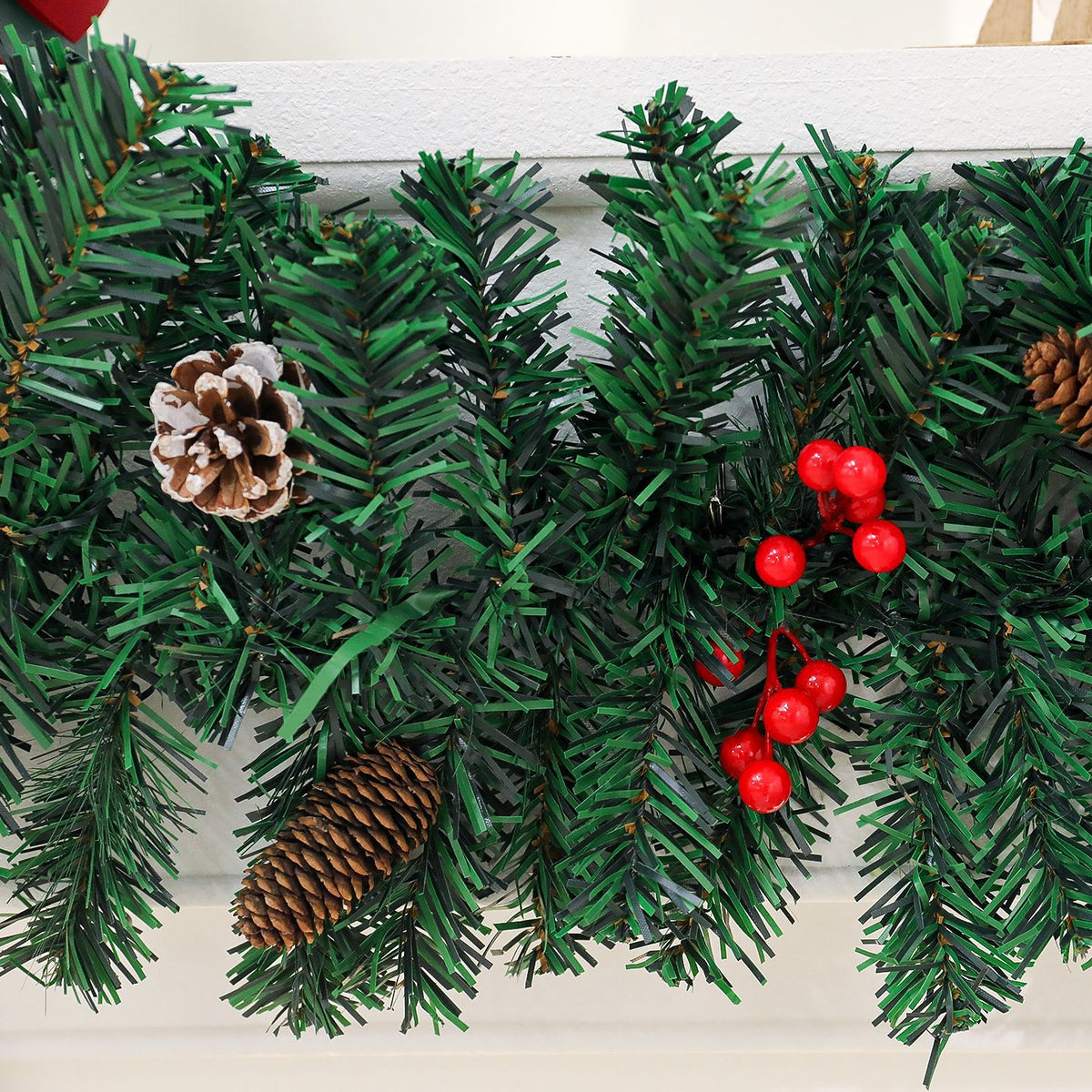 Warm light version of the pine cone Christmas wreath