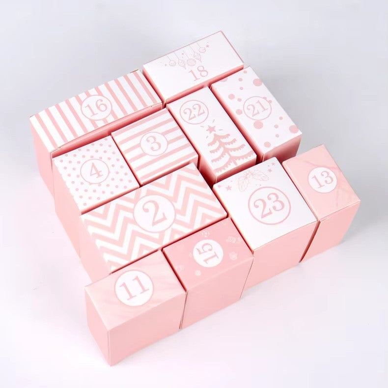 Pink cardboard advent calendar countdown box with printed paper facing