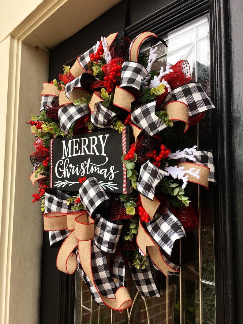 Cloth Christmas bow tied by hand rather than pressed into shape