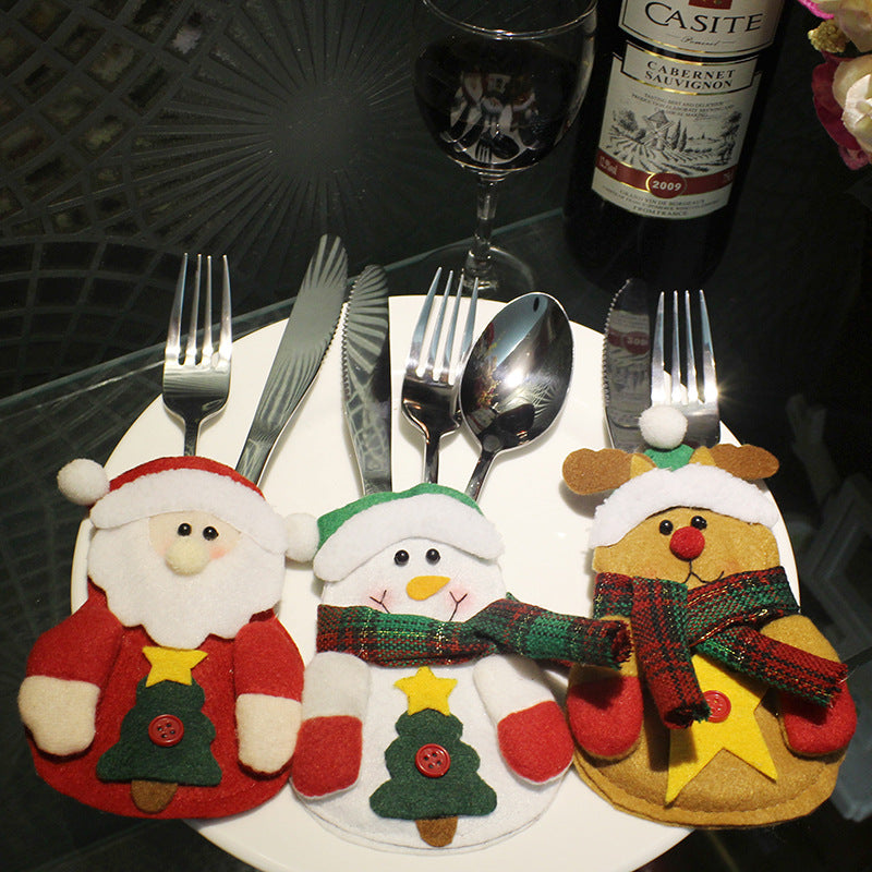 Santa Christmas silverware holder, a brushed fabric pocket for a knife and fork