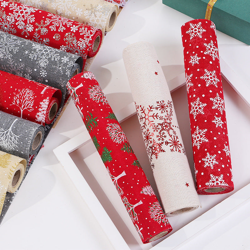 White snowflake print cloth runner from a six design range