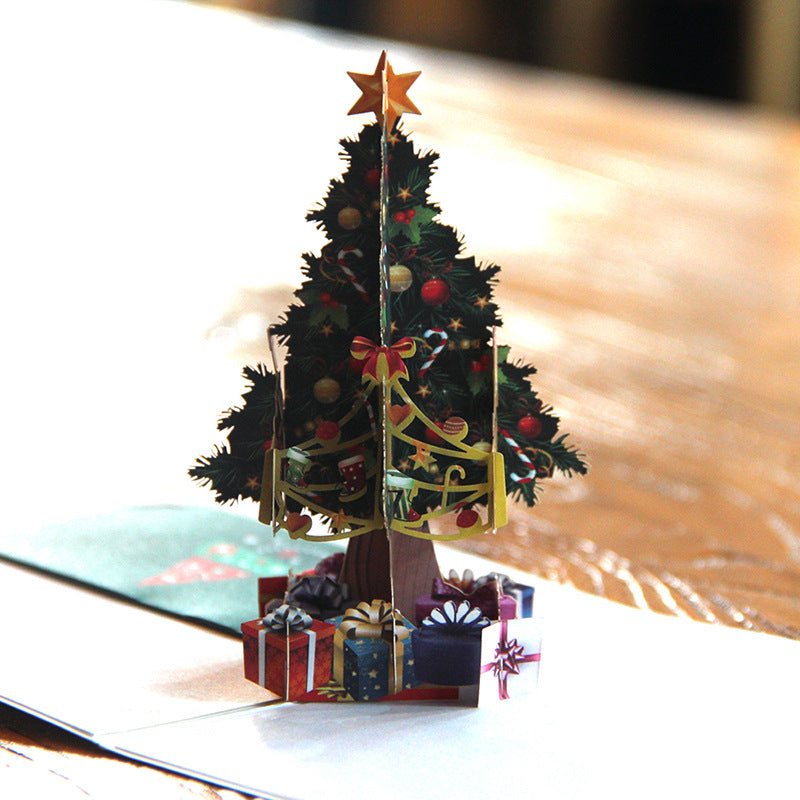 Cut-through carved pattern on the 3D Christmas tree greeting card