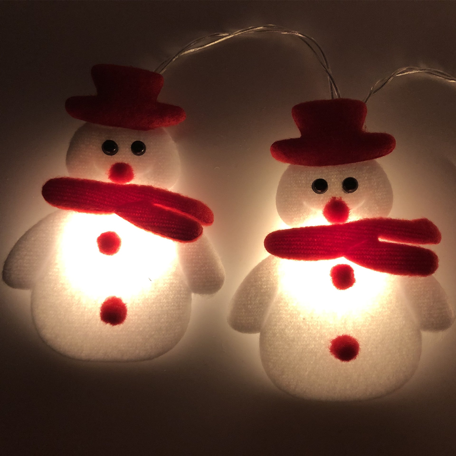 Battery powered plush Christmas light strand running at 4.5 volts with toggle switch