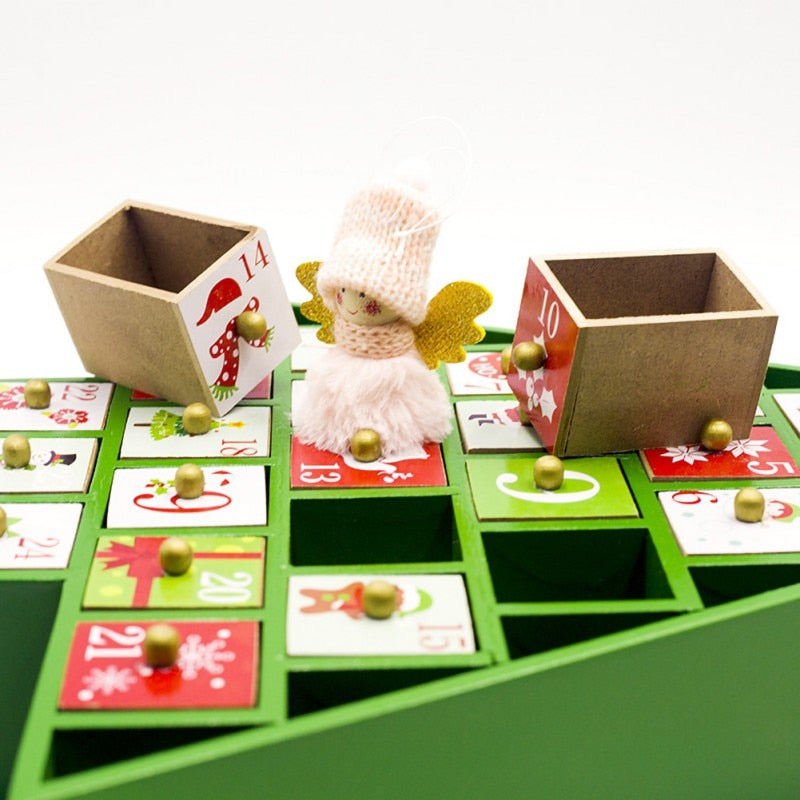 Painted numbers on the drawers of a wooden Christmas countdown calendar