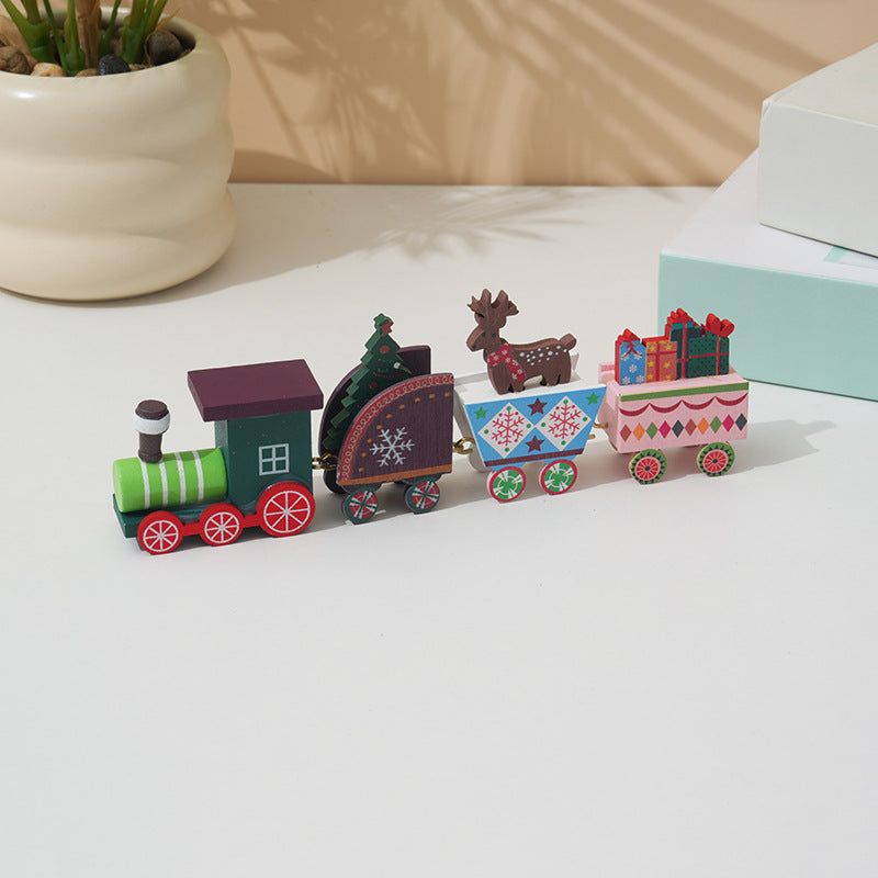Five wooden Christmas train finishes: red, white, green, deer and Santa