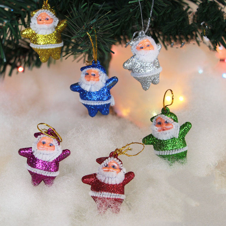 Gold dusted Santa figures, six per pack at 1.6 by 1.8 inches