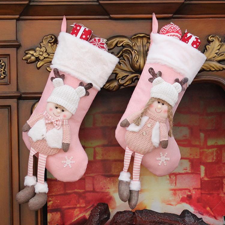 Knitted fabric Christmas gift bag with a boy doll design