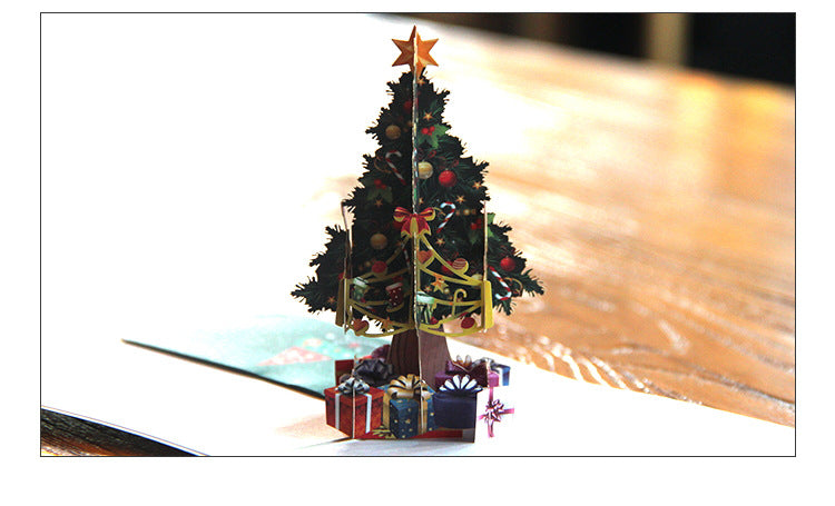 Square 5.9 by 5.9 inch Christmas card that stands on a shelf