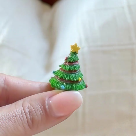 Hinge joining the two halves of the folding Christmas ornament