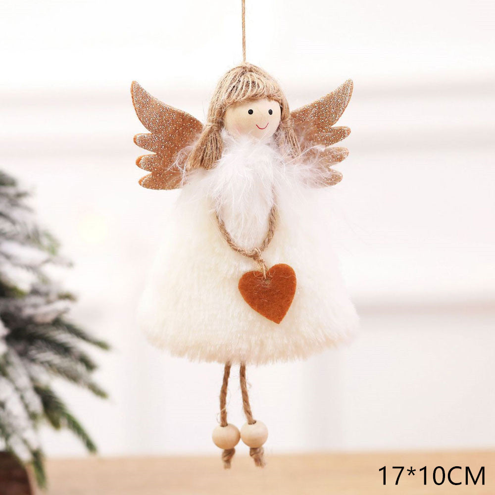 Pink doll plush Christmas ornament that hangs or props on a shelf