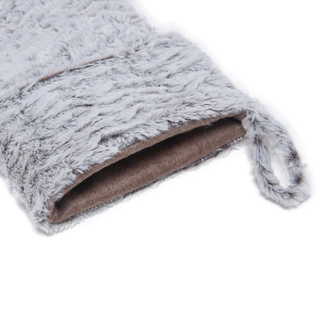 Soft fleece texture of a gray hanging Christmas stocking