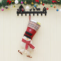 Set of three Christmas stockings in Santa, snowman and reindeer designs