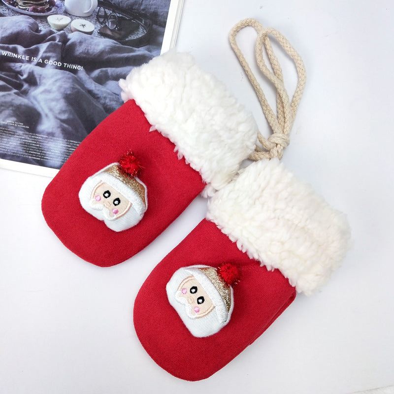 Green Christmas mittens in soft plush with neutral one size styling