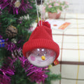 Snowman baubles offered in red, gray and white