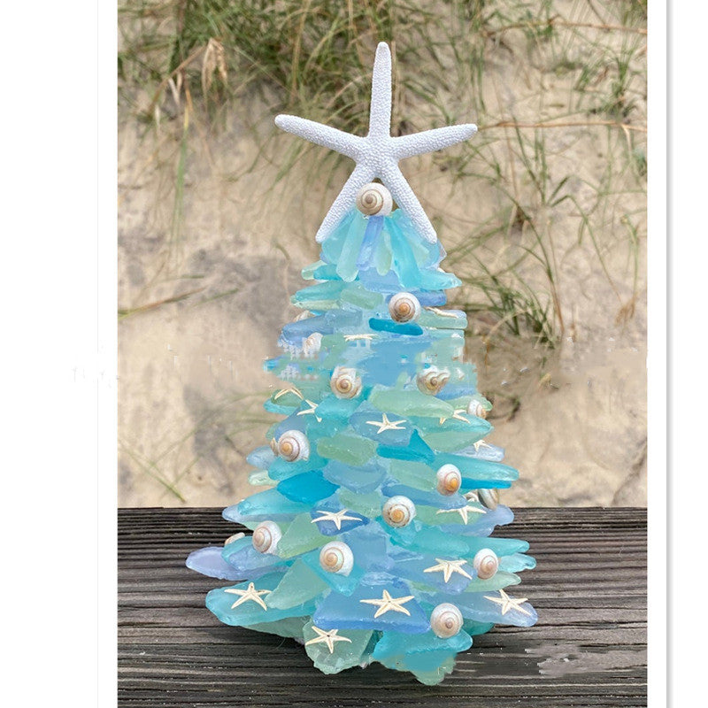 Blue coastal style Christmas tree left plain for your own trimming