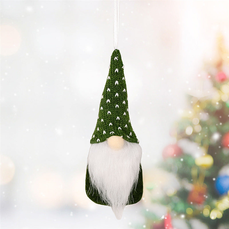 Third green knit style ornament, small and light on the branch