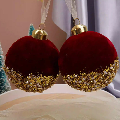 Burgundy flocked glass Christmas bauble measuring 3.1 inches across