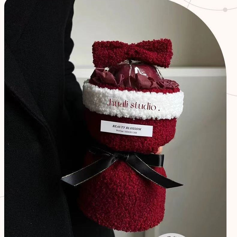 Christmas cone finished with a gift bag and a greeting card