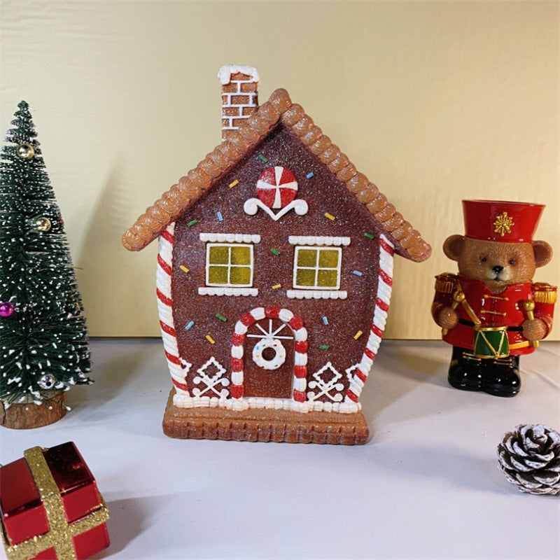Molded icing detail cast across the front of the gingerbread decor
