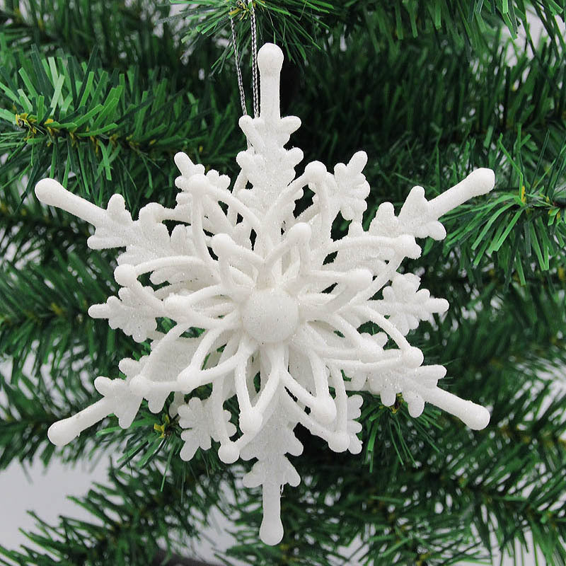 White plastic snowflake ornament, 4.7 inches across, one per order