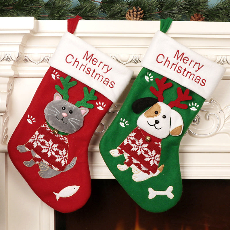 Red fabric Christmas stocking with a cartoon animal design on the front