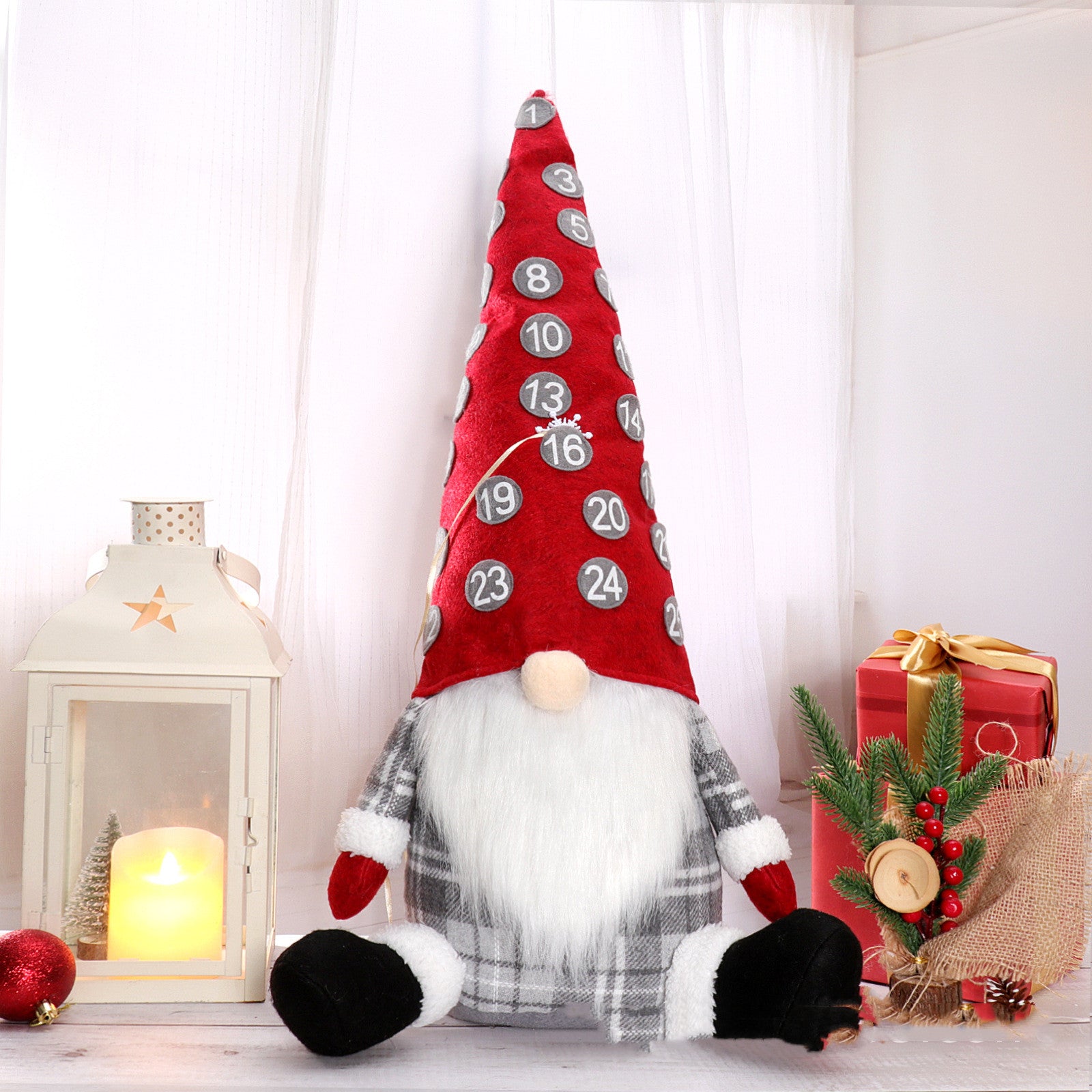 Gray hat Christmas countdown doll sewn from cloth