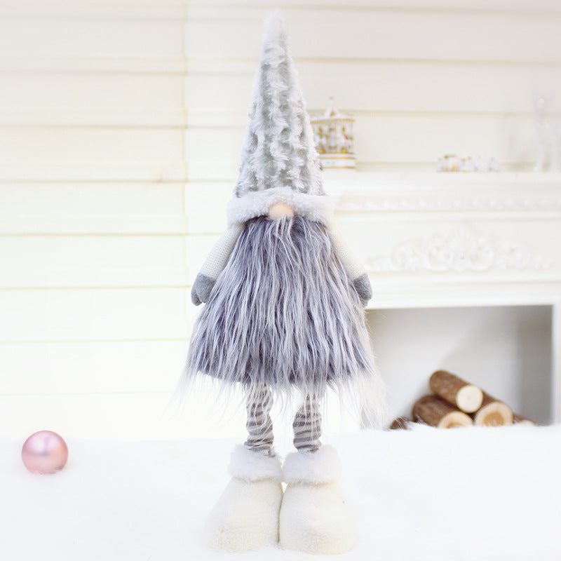 Gray plush Christmas gnome doll shaped to sit with legs down