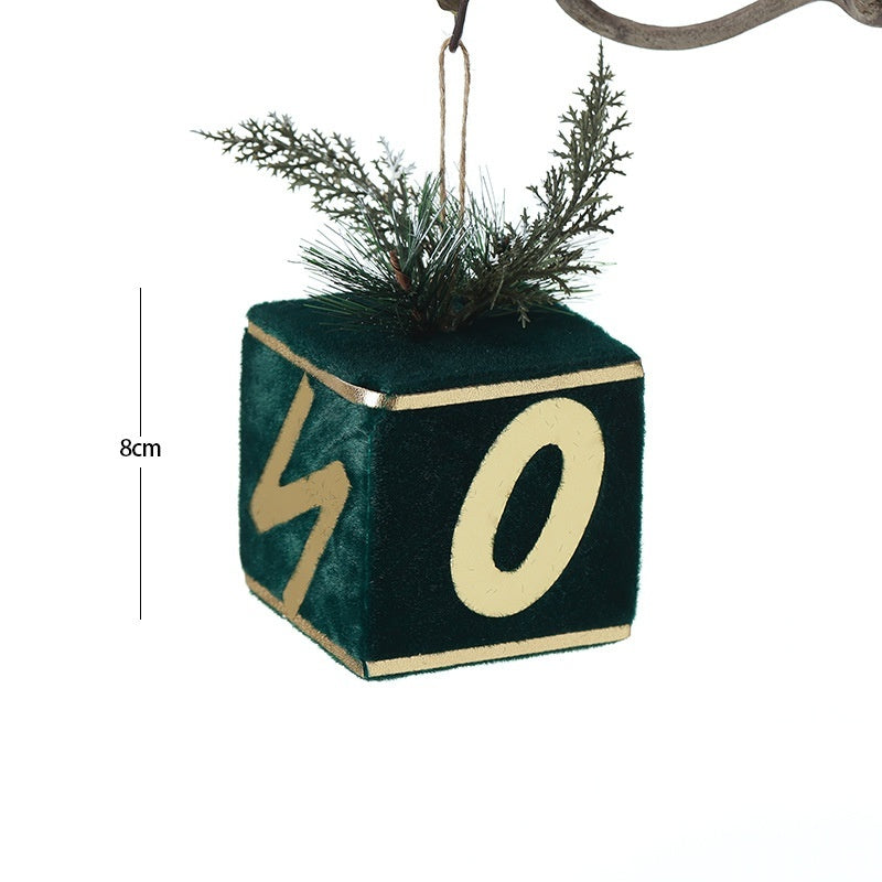 Green flocked gift bag ornament in the larger 3.1 inch size