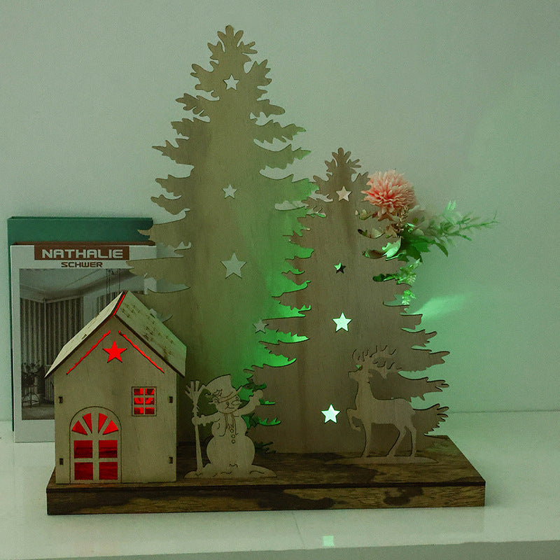 Lit wooden Christmas ornament with a built in warm white light