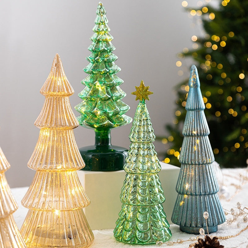 Small green five-pointed glass star ornament for a Christmas tree