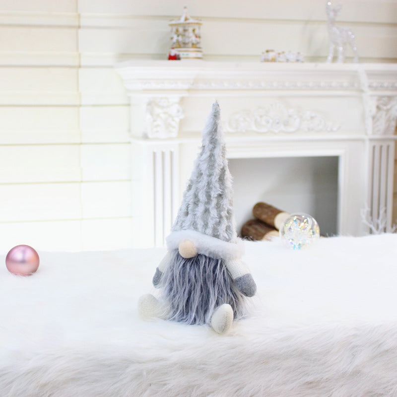 Telescopic pole running through the legs of the gnome plush doll