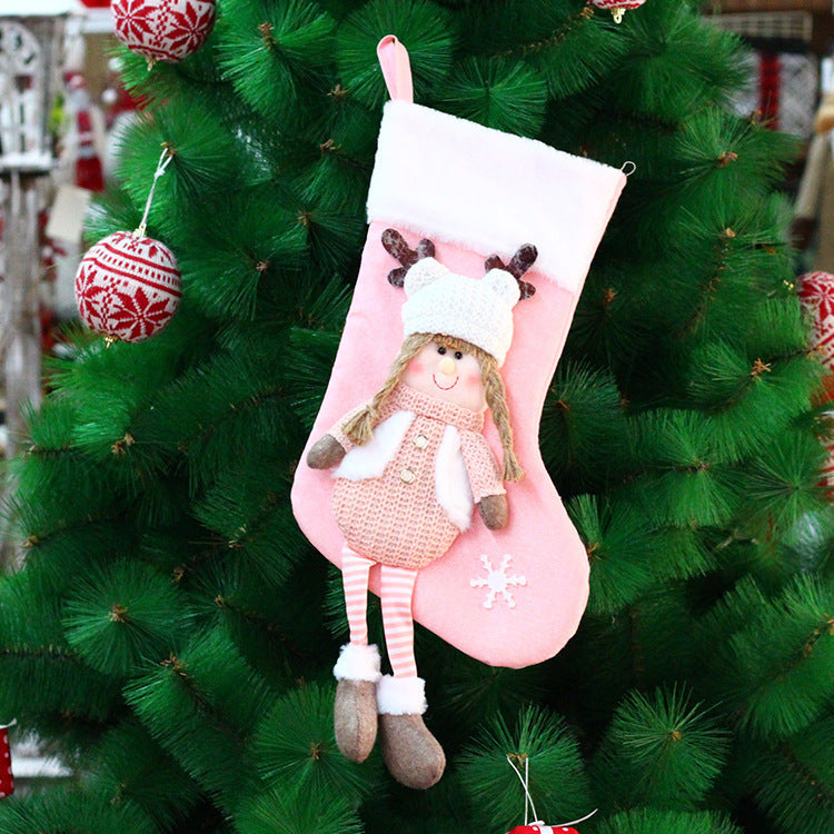 Knitted Christmas gift bag with a textured knitted face panel