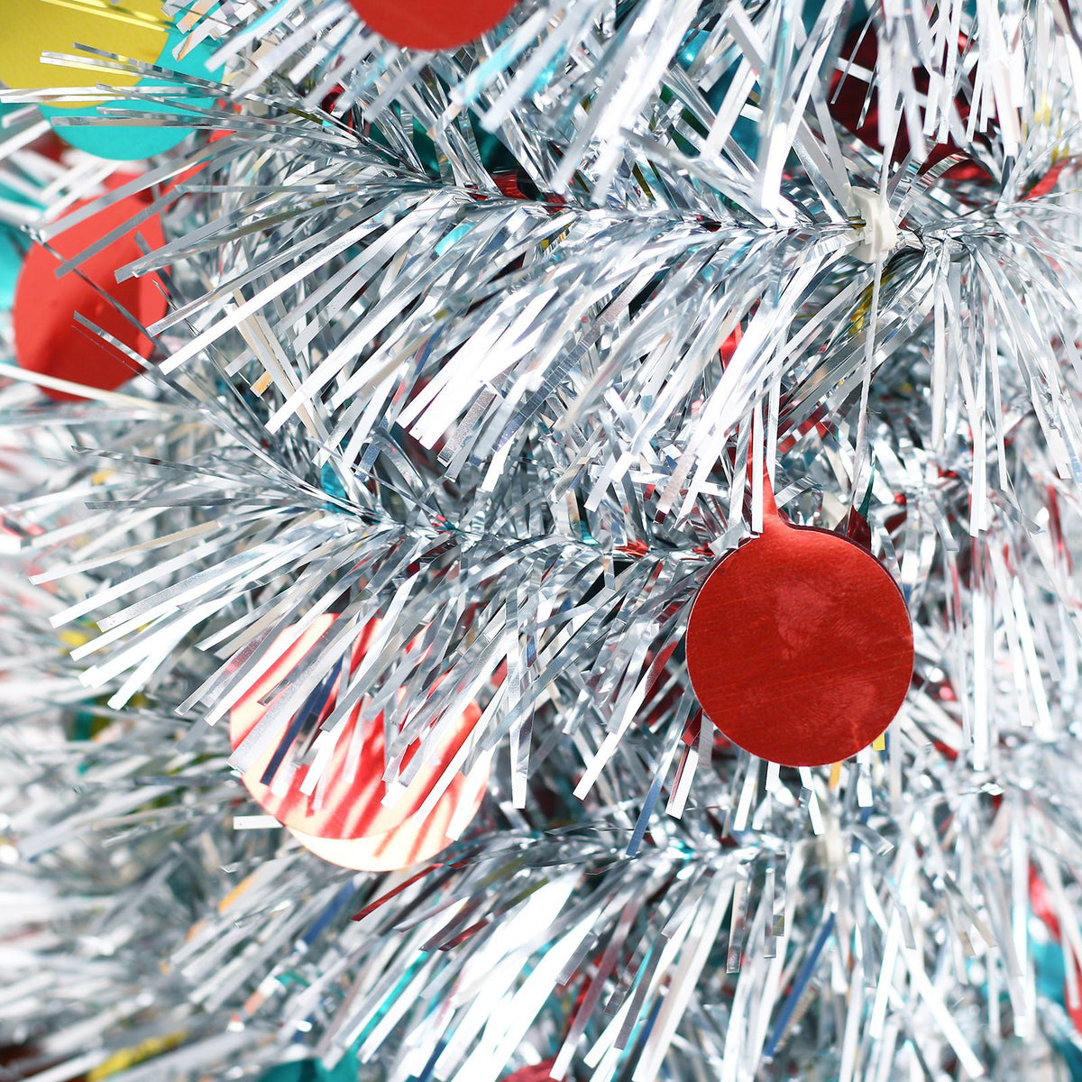 Artificial Christmas tree folded down flat, lighter than a fixed frame tree