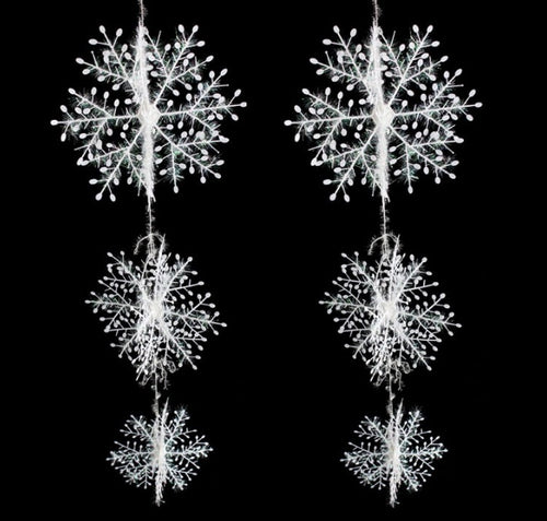 Three dimensional Christmas snowflake that opens out rather than lying flat