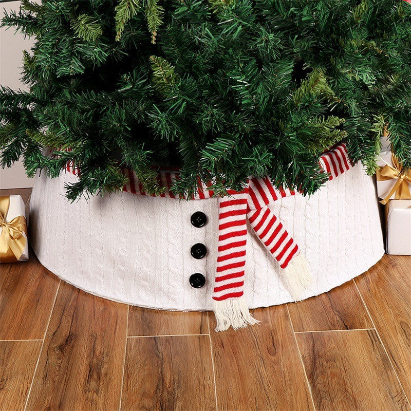 White non-woven Christmas tree collar with a beaded trim along the rim