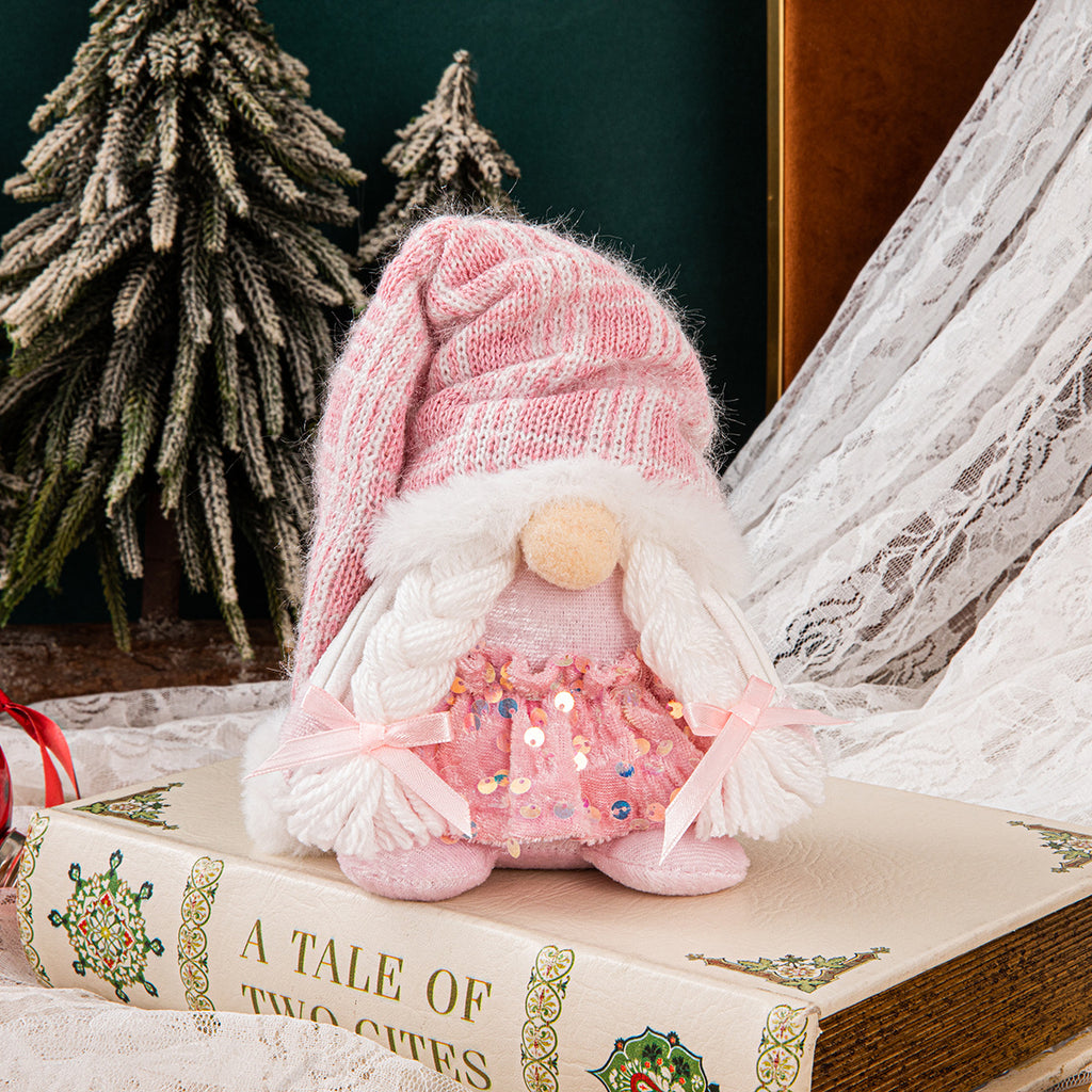 Woman figure knitted Christmas ornament finished with sequin detail
